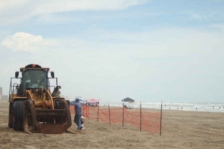 A single bulldozer remains after a beach renourisment project finished this past week at Isla Banca Park.