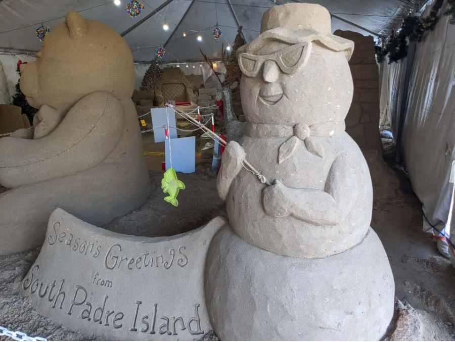 Large snowman built from sand greets visitors at Christmas on SPI