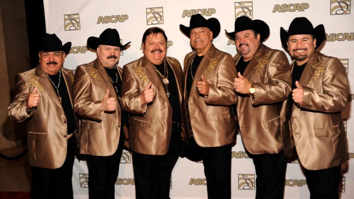 Singer Ramon Ayala, third from the left, and his band Sus Bravos del Norte arrive at the ASCAP Latin Music Awards at the Beverly Hilton in Beverly Hills, Calif. on Tuesday, March 19, 2013. Ayala will be receiving the “Creative Voice” award. (Photo by Dan Steinberg/Invision/AP)