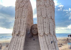 Sand sculpture of an angel